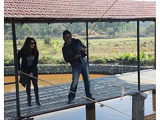 Superstar Rajesh Hamal with his wife fishing on the Pond