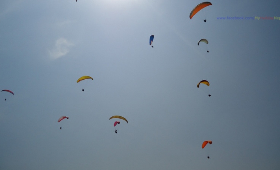 blue sky and paragliding